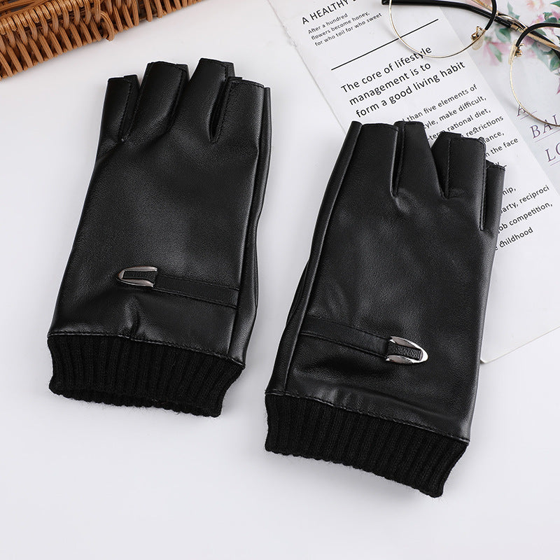 A group of Steampunk Half Finger Gloves - Fashion Statement in PU Leather by Maramalive™ on a table.