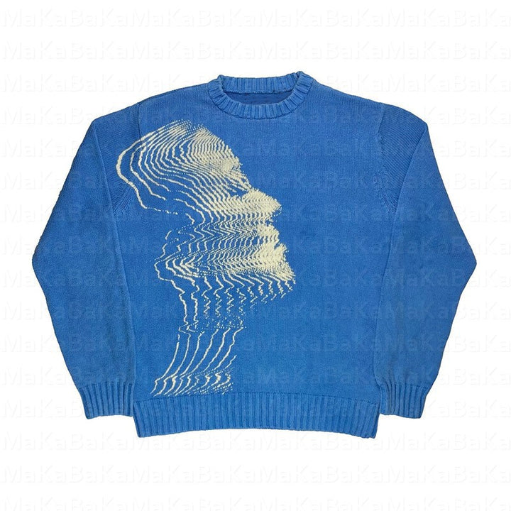 A blue, loose-fit **Cozy Anime Couples: Loose Sweaters for Relaxed Duos** by **Maramalive™** with a distorted, wavy profile of a person's face knitted in white on the front. The neckline, cuffs, and hem are ribbed.