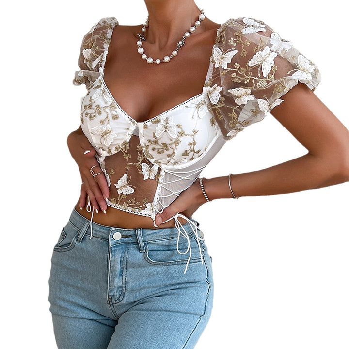 Woman wearing a Maramalive™ Ladies New Hot Girl Backless See-through Camisole with short puff sleeves and light blue jeans, enhanced by a pearl necklace and bracelets, showcasing a blend of European and American Style.