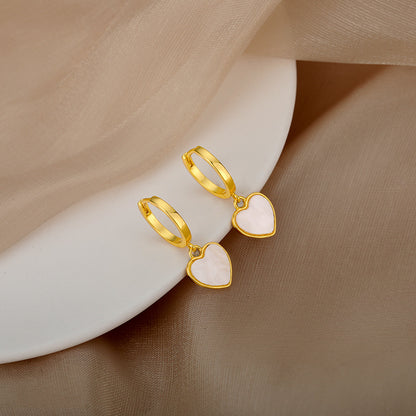 A pair of Maramalive™ gold-plated Heart-shaped Ear Clip Earrings.