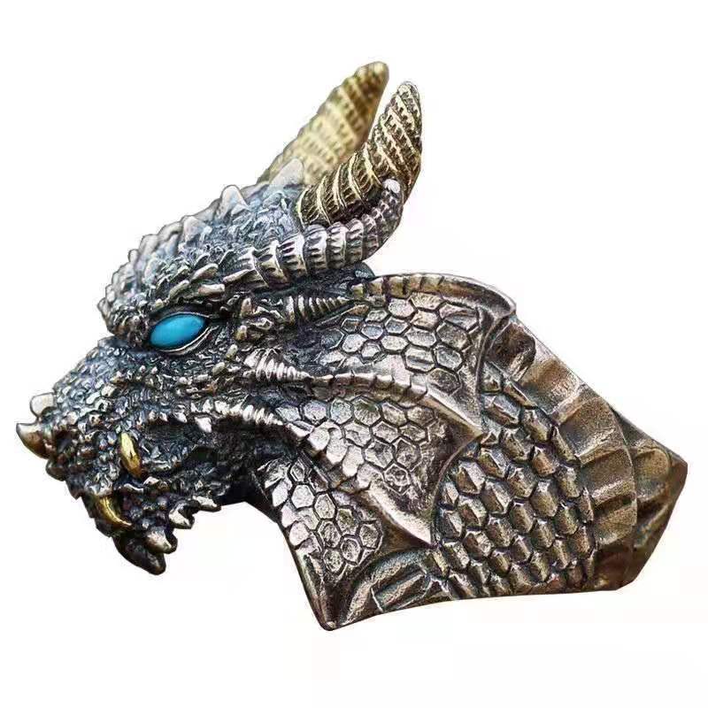 A Maramalive™ dragon ring with red eyes.