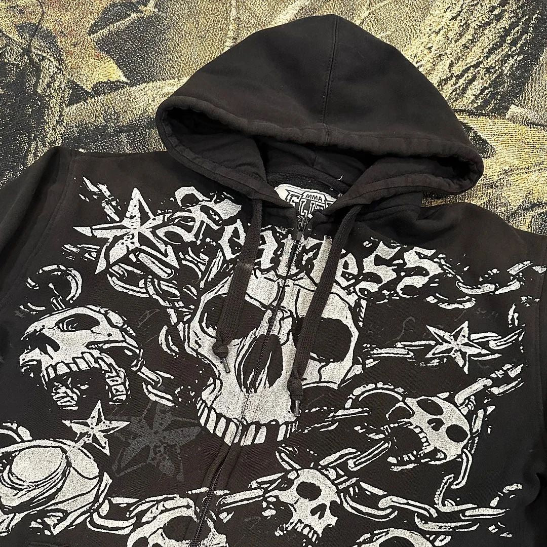 A black hoodie with a skull and chain design on the front, featuring the word "pommes" in stylized text above the central skull graphic. This Maramalive™ Punk Dark Skull Printed Hoodie Loose Zip Cardigan Sports Pullover Top embraces hip hop style, making it perfect for cold weather streetwear.