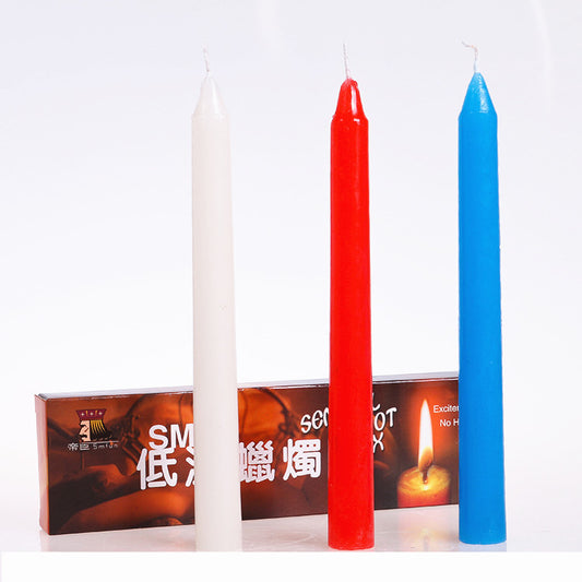 Three Maramalive™ Red, White And Blue Low-temperature Unironed Candles with a red box in front of them.