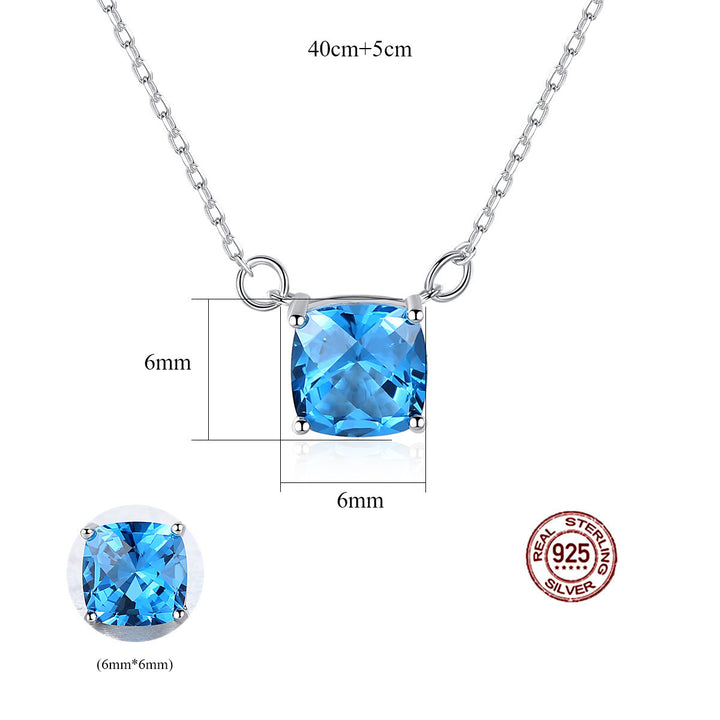 A woman wearing a Maramalive™ Stunning 925 Silver Pendant Blue Crystal Necklace and Pendant Jewelry Set.