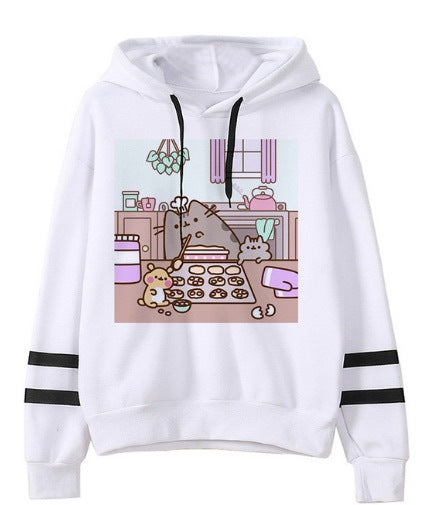A white relaxed fit hoodie with black stripes on the sleeves featuring a cartoon image of cats baking cookies in a kitchen. Crafted from soft fleece fabric, the Cozy Loose Fit Hoodies for Snug, Comfortable Warmth by Maramalive™ is perfect for lounging or casual outings.