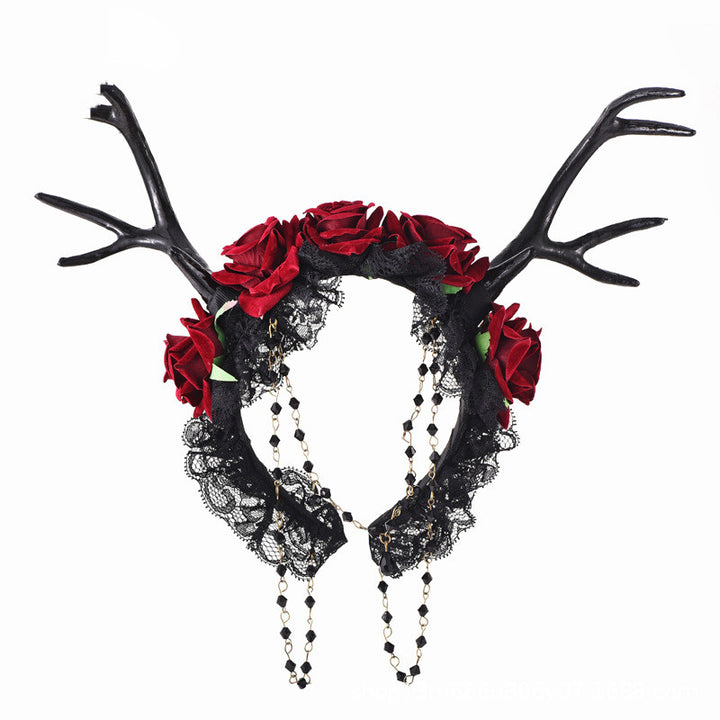 A Nightbloom Coronet: Mystical Flower Horns Gothic Antlers Rose Headband adorned with antlers and red roses, created by Maramalive™.