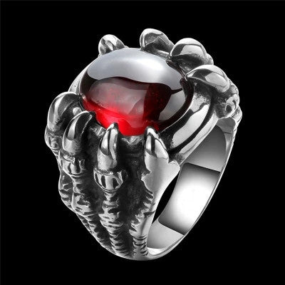 A Personalized Gothic Dragon Claw Men's Ring with claws and a red stone by Maramalive™.