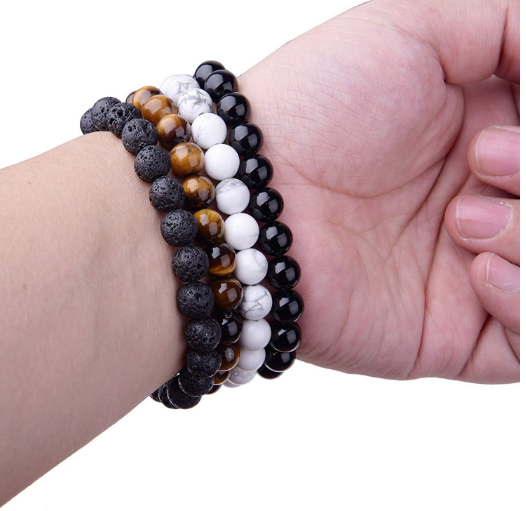 A Pure Black Onyx Bracelet for Health and Prosperity by Maramalive™ on a white background.