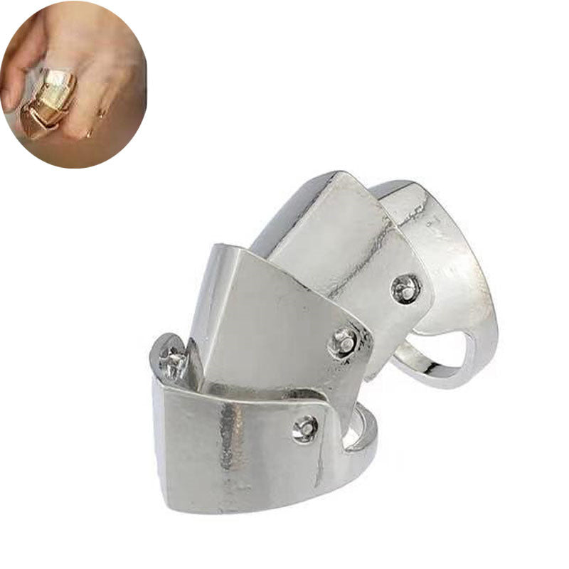 A woman is holding a silver Exaggerated Personality Knuckle Nail Rings for Women by Maramalive™.