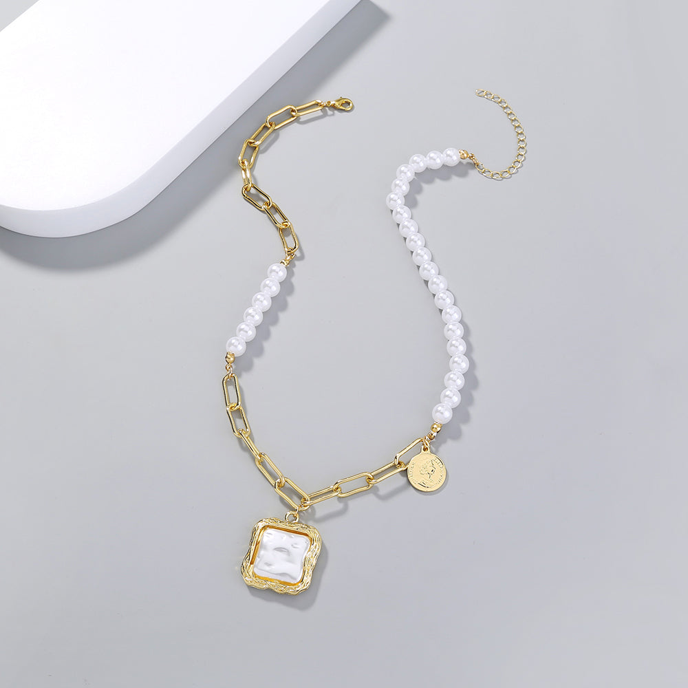 A Baroque Pearl Necklace from Maramalive™ with a gold chain and white pearls.