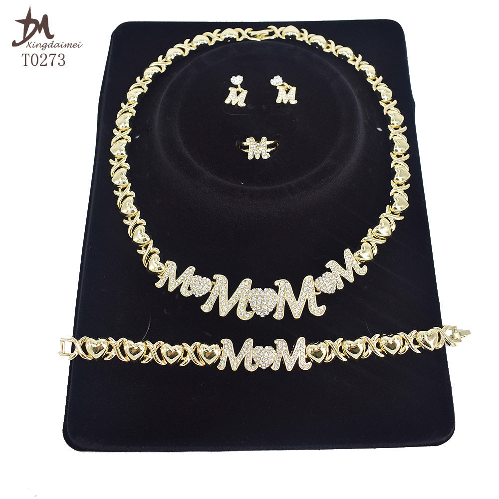 A Bling 18K Gold Mom's Jewelry Set by Maramalive™ with the word mom.