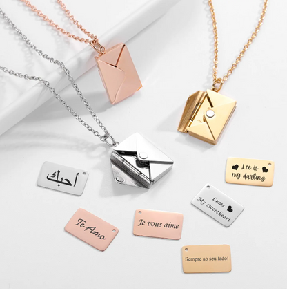A collection of Maramalive™ Envelope Pendent Necklaces with different words on them.