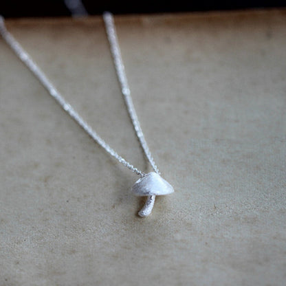 A Maramalive™ Mushroom Necklace.