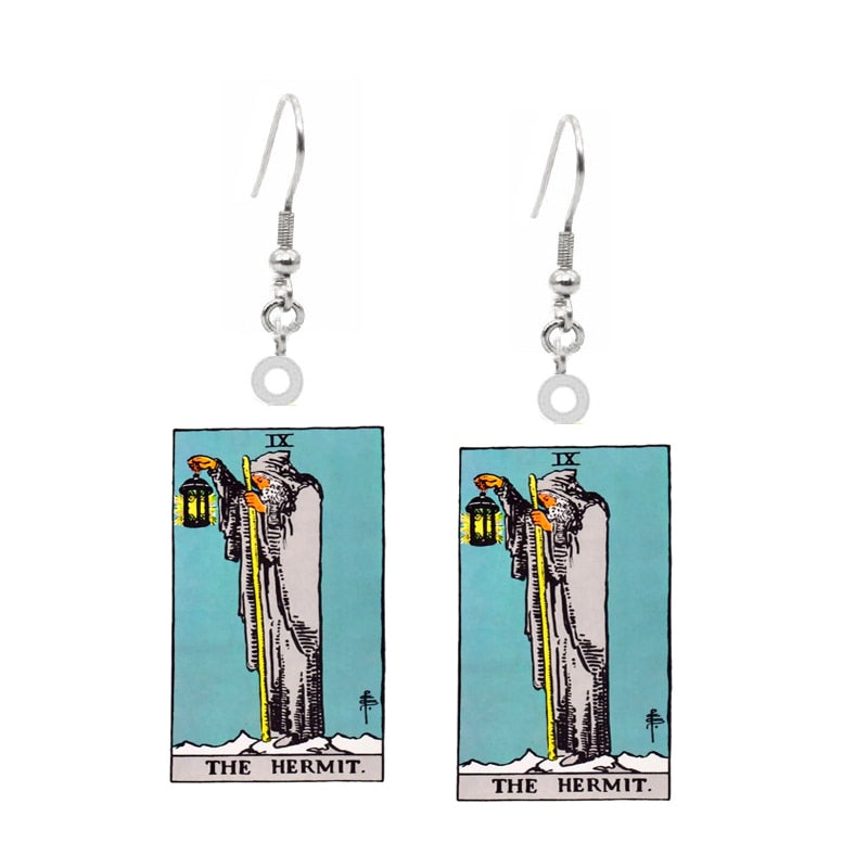 A pair of Acrylic Earrings with the tarot card on them by Maramalive™.