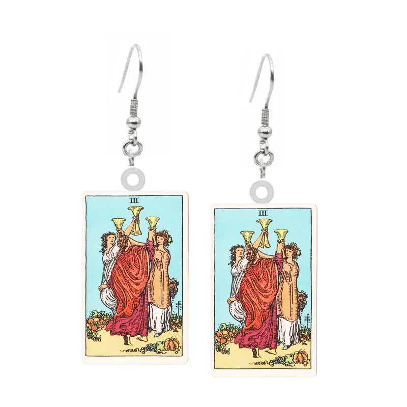 A pair of Acrylic Earrings with the tarot card on them by Maramalive™.