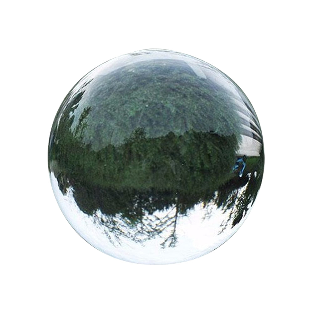 A Happy Glass Sphere with a tree in the background by Maramalive™.