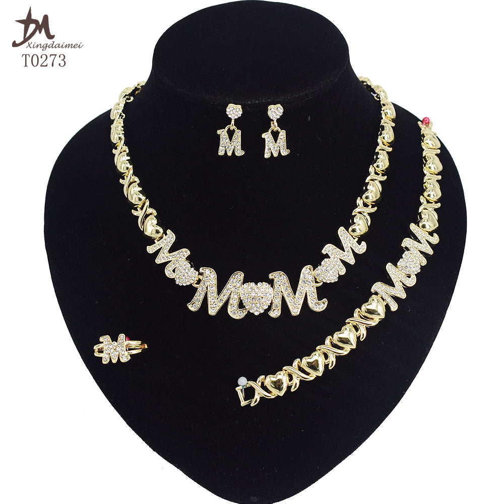 A Bling 18K Gold Mom's Jewelry Set by Maramalive™ with the word mom.