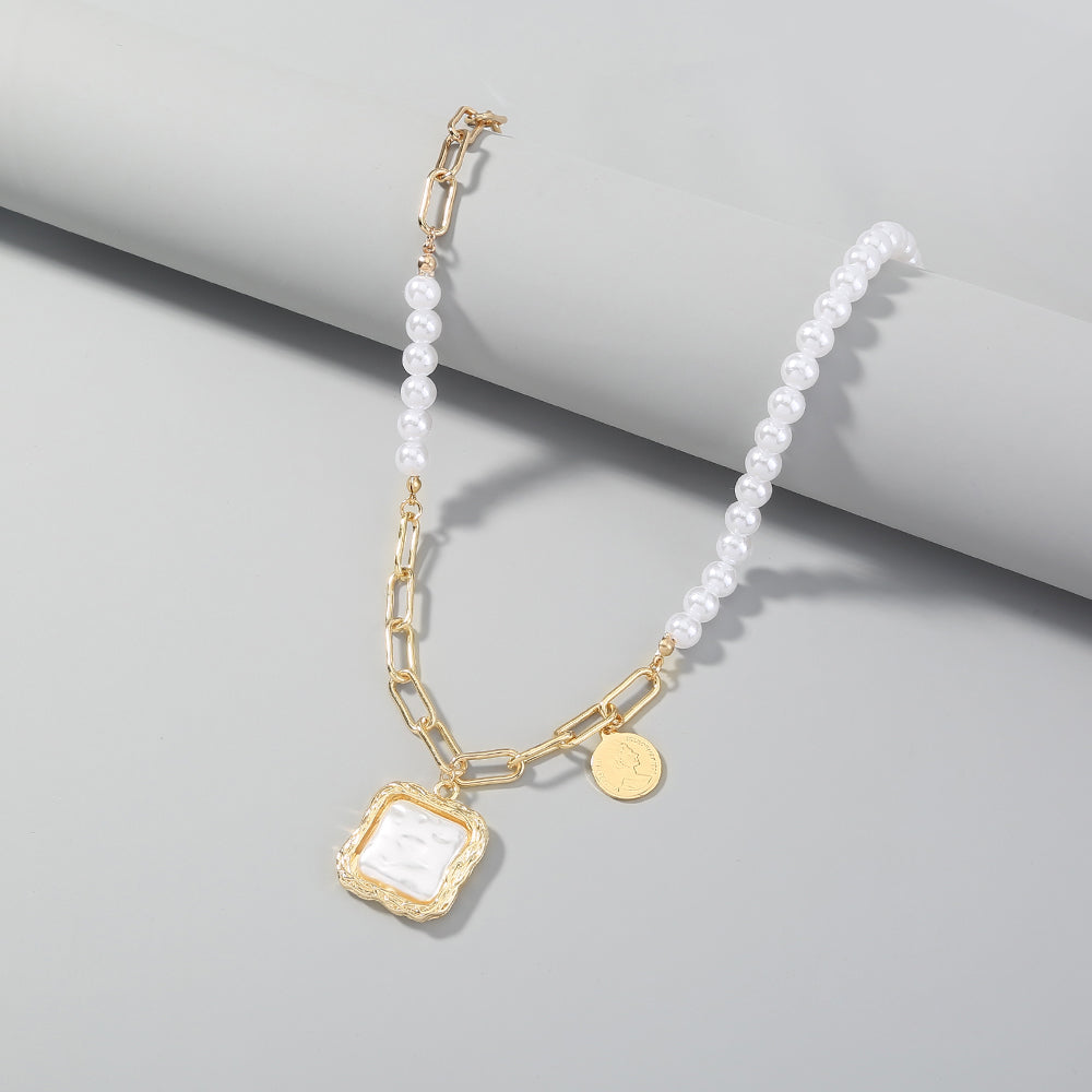 A Baroque Pearl Necklace from Maramalive™ with a gold chain and white pearls.