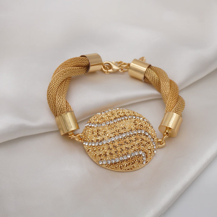 A Maramalive™ Fine Gold Jewelry Set with diamonds.