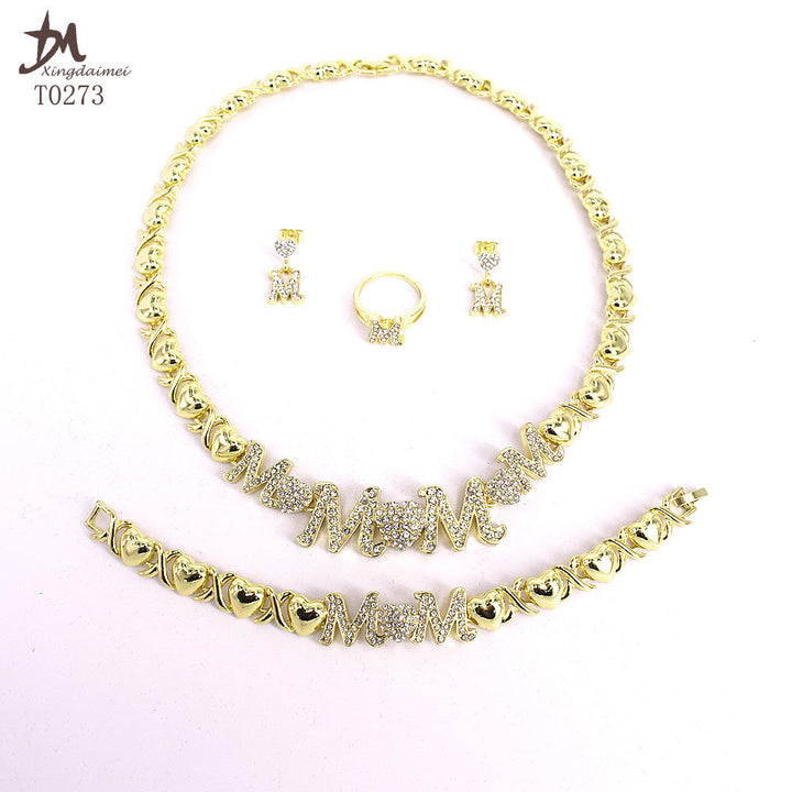 A Bling 18K Gold Mom's Jewelry Set by Maramalive™ with the word mom.